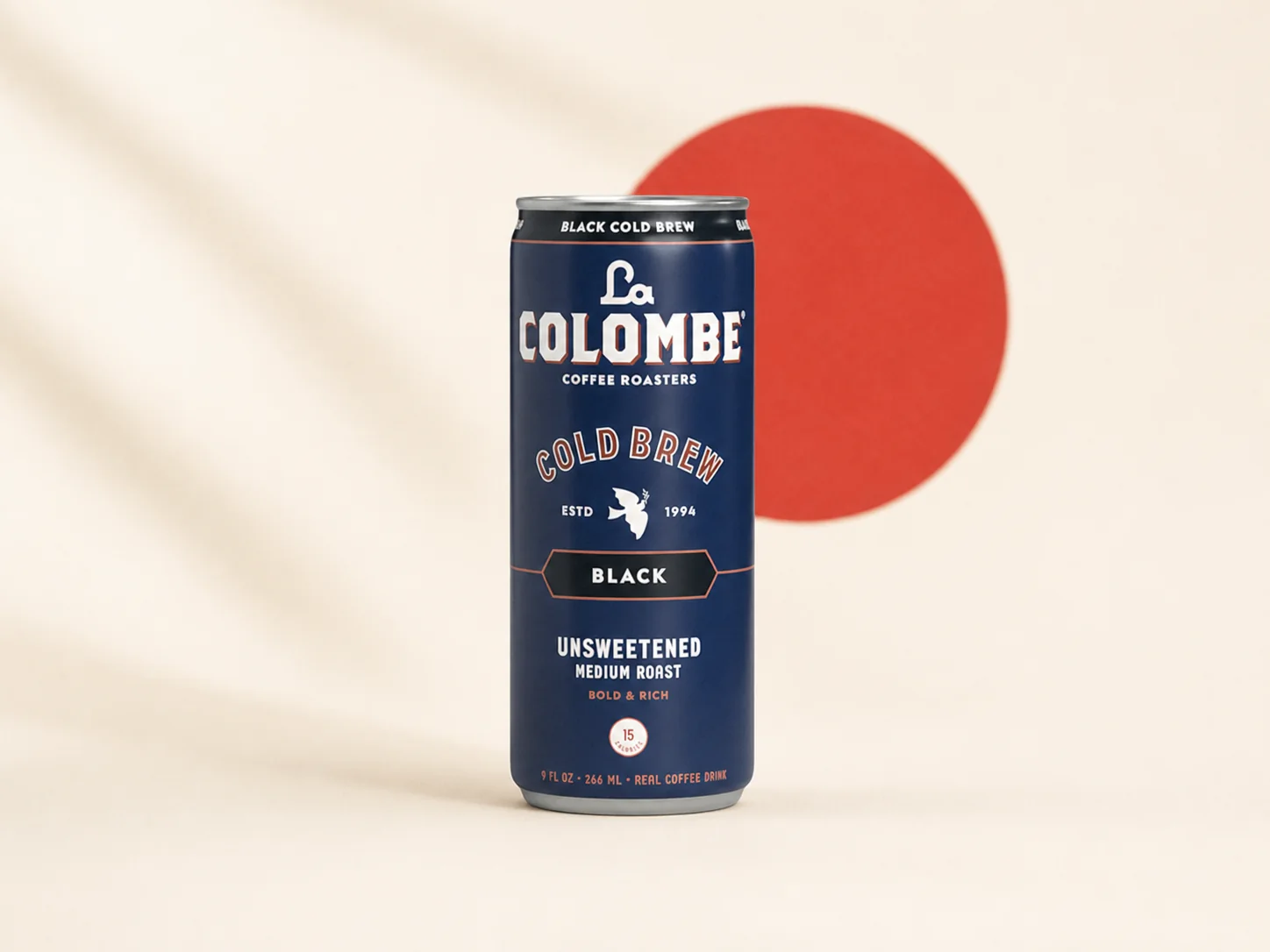 La Colombe Black unsweetened cold brew can on a warm cream background